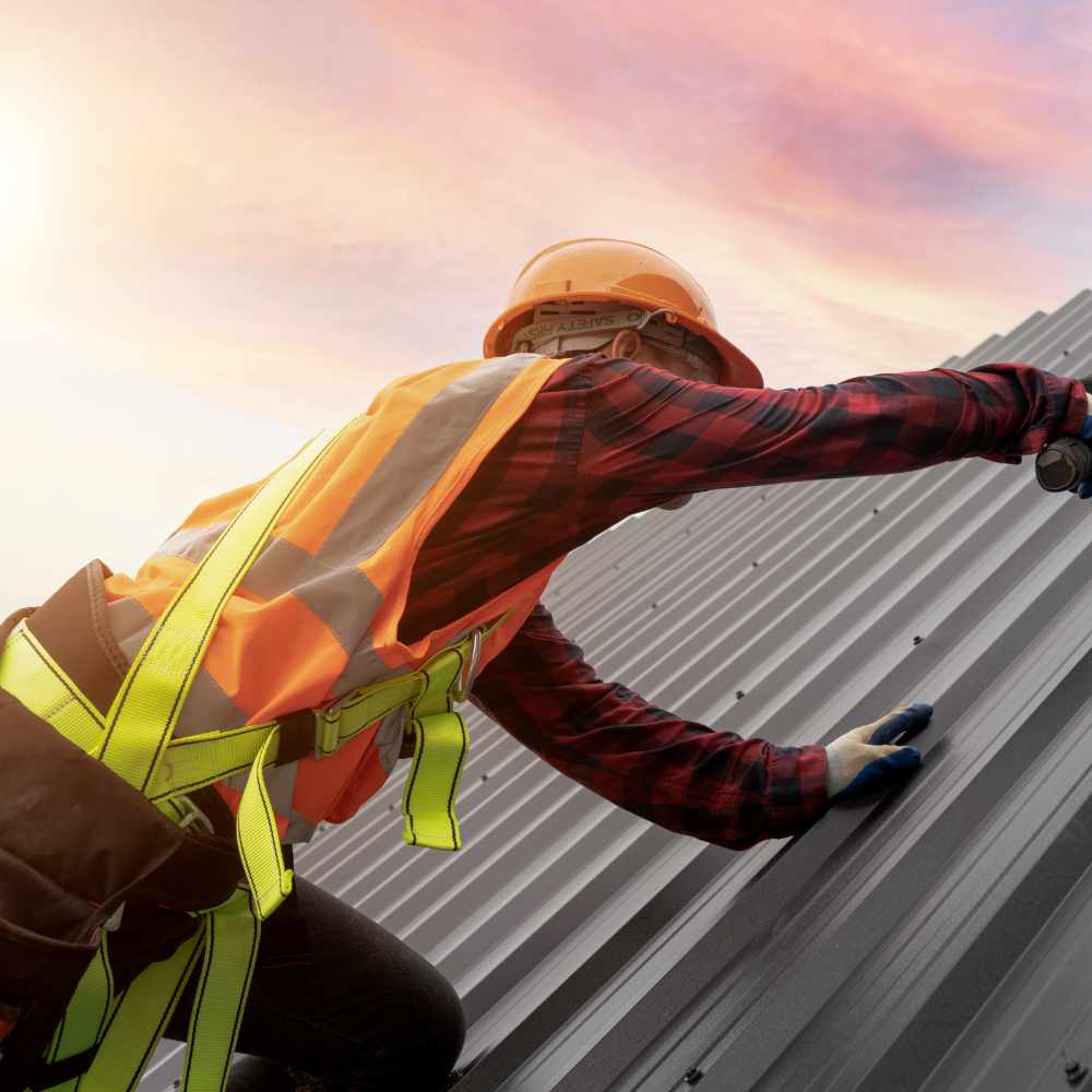 a commercial roofer working on a property in alabama