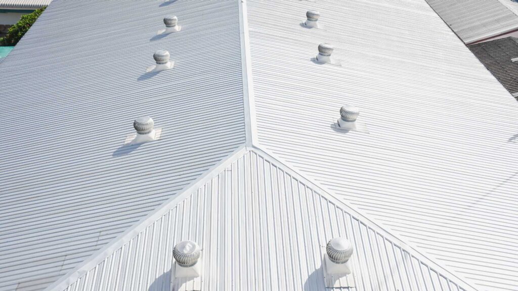a large silver metal roof in theodore al