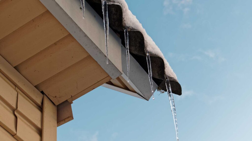 a home with metal flashing under a metal roof